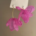 Fuchsia flower pearl earrings variant showing exaggerated pink fabric petals and pearl studs. - Asymmetric Pink Flower (35#)