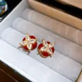 Exquisite red floral stud earrings with sparkling marquise zirconia and gold-tone finish. - Geometric / Silver / Gold Red