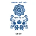 Herbal semi-permanent temporary tattoo sticker featuring blue mandala floral chest design. - GZ-029