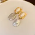 Exquisite baroque pearl drop earrings with textured gold square frames for elegant women. - 139# Pleated Pearl