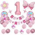 Pink birthday party balloon set featuring a number one foil balloon and banner decor. - Number 1 / Pink