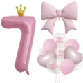 Nahaufnahme Details des rosa Nummer 7 Kronen- und Schleifenballon-Sets für Geburtstagsfeiern. - Zahl 7 / Rosa