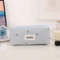 Cute canvas pencil case with bow embroidery, large capacity aesthetic stationery pouch for school. - Blue