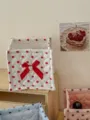 Quilted storage basket fabric detail with red polka dots and cute bow decoration - White with Red Polka Dots