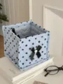 Quilted square storage basket with polka dots, bow design, perfect for desk and dorm organization. - Blue