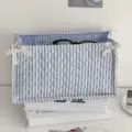 Blue and white stripe quilted storage basket with cute lace bows, perfect for desktop organizing. - Blue Striped