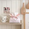 Pink polka dot fabric tissue box cover with cute flower petal folding design for home decor. - Pink Polka Dot Flower Tissue Boxes