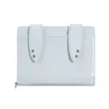 Detail view of light blue glossy passport wallet featuring cute bunny ear flaps and metal eyelets. - Blue