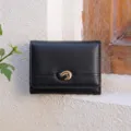 Minimalist black trifold wallet for women with metal D-buckle, compact multi-card slot design. - Black