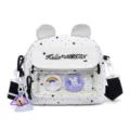 Cute star print shoulder bag detail with bear ears, clear front pocket and hanging charm. - White