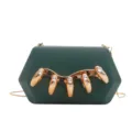 Acrylic clutch chain shoulder crossbody box bag detail showcasing unique rhinestone metallic hardware. - Dark Green