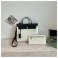 Stijlvolle tweekleurige canvas handtas met clutch, ruime schoudertas voor dagelijks gebruik. - Schoudertasset / Wit en Zwart