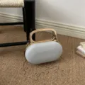Elegant light grey acrylic hard shell handbag with shiny gold handle and chain strap for women. - Gray