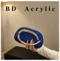 Exquisite blue rhinestone acrylic evening clutch bag with striking gold metal ring handle. - Blue