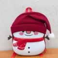 Detailed view of kids cute snowman shape EVA shell backpack with red hat and scarf for school. - Red