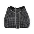 Detailed view of the sparkling rhinestone bucket bag with silver chain strap and metal eyelets. - Silver