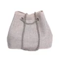 Close-up view of the sparkling rhinestone bucket bag with shiny silver chain detail. - Beige