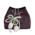 Close up detail of sparkling rhinestone bucket bag with pearl tulip charm and chain strap. - Pink With Pendant