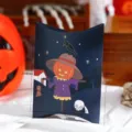 Halloween pillow gift candy paper box with cute pumpkin scarecrow design, perfect for party favors. - Style A