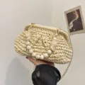 Chique stro geweven schoudertas met parel handvat, vintage strand handtas voor dames. - Steen Textuur Handvat Stijl / Broken Wit