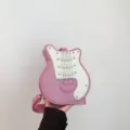 Pink guitar shaped crossbody bag for women, creative PU leather novelty shoulder bag with wide strap. - Pink