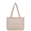 Lightweight padded puffer shoulder bag for women, casual quilted commuter tote in soft light pink. - Off White