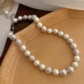 Detailed close-up of the French vintage necklace featuring alternating pearls and silver beads. - 1# Necklace - Silver