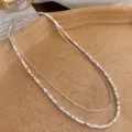 Exquisite double-layer silver necklace detail, featuring a textured bead chain and fine chain. - #18 Necklace - Silver-Tone Faux Hammered Double Layer