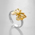 Anillo de mariposa bicolor de acero inoxidable, elegante joya de dedo abierta ajustable. - Estilo de Mariposa Calada Dorada