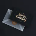 Schwarze Geburtstagskarte mit Goldfolien-Text, transluzenter Umschlag und Aufkleber als Geschenk. - Alles Gute zum Geburtstag Kerze / 50 Blatt