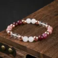 Squisito braccialetto di perle di cristallo multicolore con distanziatori oro rosa. - Mix Cristallo Gemma
