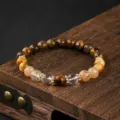 Bracciale di perle in pietra naturale con quarzo occhio di tigre e cristallo unisex. - Occhio di Tigre Cristallo Bianco