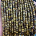 Close-up detail of natural tiger eye tube beads spacer loose beads for DIY craft making. - Tiger Eye Stone Bracelet