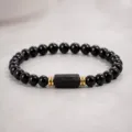 Black obsidian gemstone beaded bracelet with gold spacer beads and raw tourmaline stone. - 6mm Beads / Obsidian & Black Tourmaline