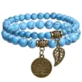 Bohemian turquoise beaded double layer bracelet with vintage tree of life and leaf charms. - Blue with Black Thread