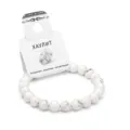 White howlite gemstone beaded stretch bracelet displayed on a retail hanging card. - White Howlite
