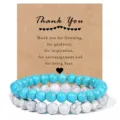 Detail view of beaded stone bracelets with thank you card packaging for couples and parties. - Blue Turquoise + White Turquoise