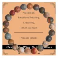 Close-up detail of natural Picasso jasper beads bracelet, exquisite gemstone crystal texture. - 02