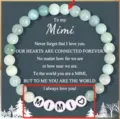 Close up detail of handmade beaded bracelet with letter charms and sentimental message card. - Gift Card Included / Green MIMI
