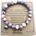 Pulsera de cuentas de jaspe cebra rosa con dije de corazón y tarjeta de 40 cumpleaños. - Estilo 40 Cumpleaños