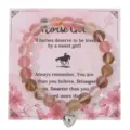 Dettaglio bracciale con perline in agata cristallo rosa e ciondolo a cuore e carta. - Con Carta Confezione / Fluorite Cuore