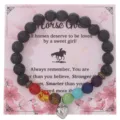 Bracciale con perline di chakra in pietra lavica e ciondolo a cuore su carta espositore cavallo - Con Carta Confezione / Cuore Colorato