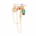 Detailed view of a sweet and cute alloy brooch featuring cactus, sun and tassel charms. - Letter A