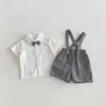 Toddler boy summer shirt and suspender shorts outfit detail, black and white plaid design. - 80cm / Black