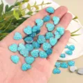 Blue glitter heart flatback resin cabochons for DIY crafts, sparkling 12mm accessories. - Heart Resin Flatback Rhinestone / 100 Pieces/Pack (12mm) / Aqua Blue AB