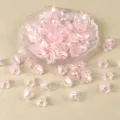 Close-up details of pink AB coated bellflower beads for DIY handmade jewelry crafts. - Bluebell Flower / 100 Pieces/Pack / Light Pink Transparent