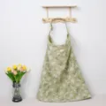 Green floral nursing cover detail, double layer cotton gauze for breastfeeding privacy. - Green Floral with Wooden Ring