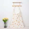 Detailed showcase of soft cotton nursing cover featuring cute mushroom print pattern. - Mushroom Iron Buckles