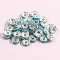 Colorful rhinestone ring spacer beads for DIY bracelets and handmade jewelry making accessories. - 50 Pieces Pack (0.76x0.3cm) / Lake Blue