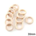 Vue detaillee de anneaux en bois de 30mm, anneaux de bricolage naturels pour projets artisanaux. - Boucle en Bois / Paquet de 30 Pièces (30mm)